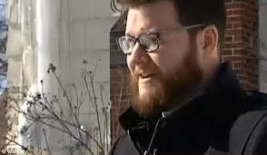 Huge chunks of ice fall off building and crush car in Portland, Maine