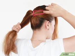 Or do you mean the sleek pulling the hair straight back into a ponytail, gathered at the neck, perhaps in a bun, neat, tidy and professional? How To Do A Professional Ponytail 9 Steps With Pictures