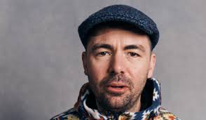 Kneecap director Rich Peppiatt chats his wild film about the Irish language  rap group