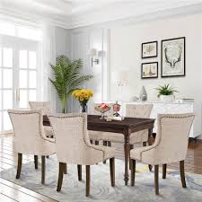 Sporting an hourglass shape, this upholstered dining chair works well in a variety of dining room arrangements. Topmax Linen Upholstered Chair Set Of 6 Beige