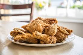 Carefully ladle the lard or frying oil into a medium heatproof bowl and whisk in the cayenne pepper, brown sugar, 3/4 baste the spice mixture over the hot fried chicken and serve immediately; These Restaurants Have The Best Fried Chicken In America