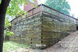 Due to water draining off the driveway, the ties were usually wet, or at least moist. Retaining Walls Suwanee Ga Engineered Retention Wall