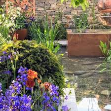 The Silent Pool Gin Garden Was My Favorite Of All Copper Sculpture Plant Choices Colors And An Intriguing Use Of Materi Asian Garden Plants Dwarf Conifers