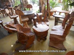 It can be used both inside and outside as it is weather resistant, which makes it a great choice for a dining table. Teak Root Wood Furniture Set Including Chairs And Table Teak Wood Table And Chairs Set