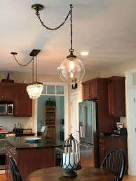 We have a very large dining table (it's 9 feet long!), and the light socket is way off center in the room, so we had a few interesting dilemmas to solve before we could get started. 31 Dining Room Chandeliers That Will Make The Atmosphere Romantic Pandriva Dining Light Fixtures Dining Room Lighting Dining Lighting