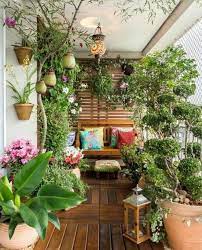 Create A Tropical Garden Oasis In A Balcony With These Ideas Small Balcony Garden Apartment Balcony Garden Small Patio Garden
