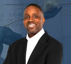 Latin Times: "You do realize you're an unelected bureaucrat?" Wrong: He's  "Kramer by the Water Cooler" in Seinfeld episode #13. And he's about to get  fired from a job he never had. "
