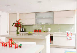 Using green on a feature wall or as an accent color on just one element of your kitchen's architecture can be very effective. Sage Green Kitchen Design Ideas