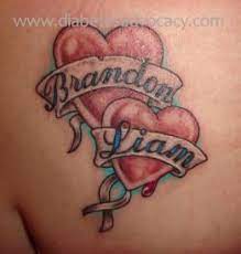 This name tattoo is made way much better with the 15. Diabetes And Awareness Tattoos Love Heart Tattoo Heart Tattoos With Names Heart Tattoo