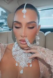 Kim Kardashian Panics as a Diamond Falls Loose from Necklace During Trip to  India