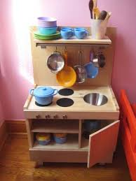 Rookie Moms Build Your Toddler A Play Kitchen For Less Than 50 Diy Play Kitchen Toddler Play Kitchen Play Kitchen