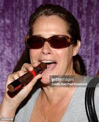 Eli Noor of Sophia Fiore takes a moment to talk to James Gandolfini....  News Photo