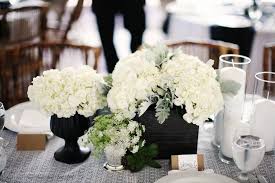 A good celebration is as much about the presentation as it is about food. White Hydrangea Wedding Centerpiece