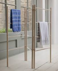You can use a wooden slab to attach to the ceiling. Wooden Towel Drying Rack Off 66