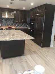 Slight visibility to the wood character and tone are common, and are especially noticeable on lighter tones. Maple Cabinets In Thatch Finish In Palos Verdes Dining Room Design Espresso Kitchen Cabinets Cool Kitchens