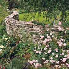 Find landscape rock walls ideas. Stone Wall Ideas Better Homes Gardens