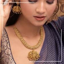 Buy TARINIKA Antique Gold Plated Ishani Long Necklace Set with Lakshmi Idol  Design