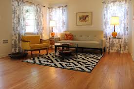 If your living room is already fully carpeted, don't think you have to go tearing it up! Mid Century Modern Living Room With B W Rug Midcentury Living Room Los Angeles By Madison Modern Home Houzz