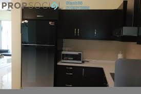 Miejsce cozy living & dining rooms with green balcony; Riana Green East For Sale In Wangsa Maju Propsocial