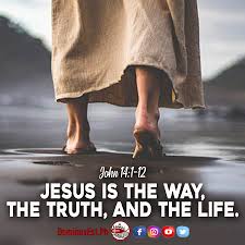 Close-up of a person's feet walking on a beach with a biblical quote overlay: 'Jesus is the way, the truth, and the life.'