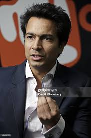 Rahul Sharma, co-founder of Micromax Informatics Ltd., gestures as he...  News Photo