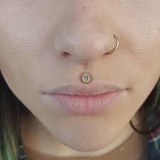 the association of on instagram check out this philtrum piercing from app member xbrainflowerx of brand x earings piercings philtrum piercing body jewelry