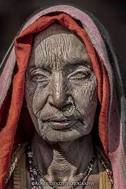 What is the name of the woman in the 1899 photograph?