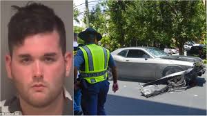 Man accused of ramming car into crowd was previously accused of beating his  mother
