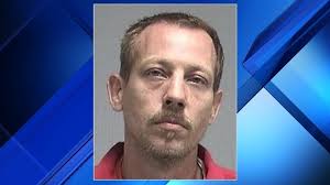 Man accused of striking man in head with hammer