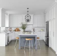 white u shaped kitchen with gray island
