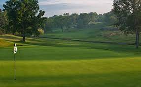 A view of a green surrounded by a collection of bunkers at wykagyl country club wykagyl cc. Stellar Field Set For 103rd Met Open Metropolitan Golf Association