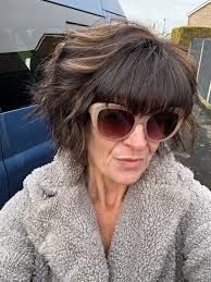 I lost my 18 year old son to suicide and have hardly any pictures of us  together. This is one of my favs (he's in grey top), could anyone remove  the guy