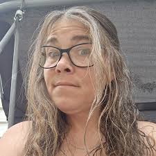 Who can alter a sweatshirt into a zip-up sweater in the Jackson/Parma area?