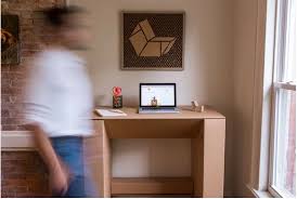 On their site, you'll find a variety of items including cardboard chairs, love seats, desks, and shelving. Cardboard Desks By Chairigami Offer A Diy Work From Home Solution