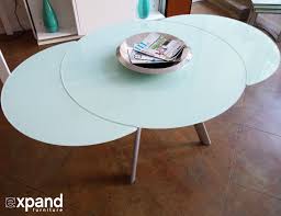 The Butterfly Expandable Round Glass Dining Table Expand Furniture Folding Table Glass Round Dining Table Round Dining Table Modern Expandable Dining Table