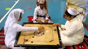 Carrom is played using small disks of wood or plastic known as carrom men (sometimes abbreviated cm, c.m. Traditional Carrom Board Game Comes Back To Life In The Gulf During Ramadan Al Arabiya English