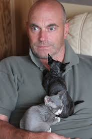 Graham, obviously makes a comfy kitten bed!