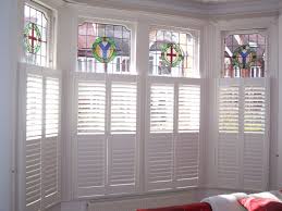 Top quality paints and stains, finishing that lasts, thanks to the uv protective lacquer that seals the colour and stops it fading in the sun. Wooden Shutters In Bay Window Discount Bedroom Furniture Bedroom Furniture Cafe Style Shutters