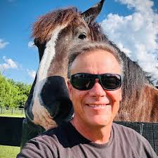 USDA veterinarian Aaron Rhyner is