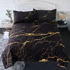 Gold gives any space the desired glamor associated with luxury and black says mystery, inviting you to sink into bed at the end of the day in the most opulent bedroom you can think of. Amazon Com Blessliving 3 Piece Marble Comforter Set With Pillow Shams Bedding Set With 3d Printed Designs Reversible Comforter King Size Bedding Sets Faux Gold Glitter Black Marble Stone Home Kitchen