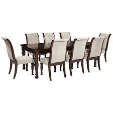 Satisfying your taste for traditional furnishings, the porter dining room extension table is beautifully elegant, without looking fussy. Ashley Furniture Porter House D697 35 8x04 9 Piece Rectangular Extension Table Upholstered Side Chair Set Furniture And Appliancemart Dining 7 Or More Piece Sets
