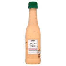 Thousand island dressing is made with a mixture of mayonnaise, sour cream, ketchup, sweet pickle relish, red onion vinegar, sugar, garlic, and salt and pepper. Tesco Thousand Island Dressing 250ml Tesco Groceries