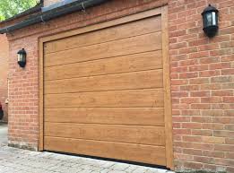 Hormann Lpu 40 M Rib Winchester Oak Sectional Garage Doors Garage Doors Roller Doors