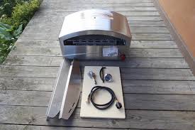 I bought an camp chef tundra stove at costco for a mere $119.00 and then discovered that a pizza oven was available. Camp Chef Italia Pizza Oven Review That S Amore