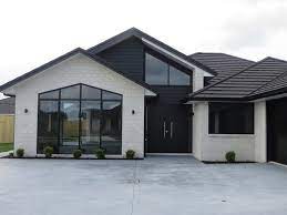 House plans to suit different lifestyles, from expansive double storey family homes to compact timber kit homes. House Bricks Nz Premium House Brick Cladding Modern Brick House House Cladding Black House Exterior