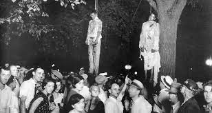 The people of marion, indiana, lynching look at source d:a) why was the black person being lynched?b) what did they do to him whilst he. Marion Indiana Lynching 1930