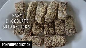 Bahan a 250 gm buttercup ¾ cwn gula aicing 2 cawan nestum 2 sudu besar serbuk koko 2 cawan tepung gandum bahan b gula aising secukupnya susu tepung secukupnya cara penyediaan. Chocolate Finger Breadsticks Jejari Roti Coklat Super Easy Delicious Kuih Raya Youtube