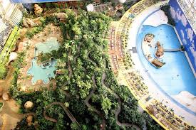 Under The Dome The World S Largest Indoor Beach Right In The Middle Of The German Countryside Beaches In The World Indoor Beach Tropical Islands Resort