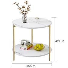 A durable metal frame connected by a cross design offers a sturdy base with clean lines for a contemporary round coffee table Sunsky Simple Multifunctional Marble Coffee Table Bedroom Double Bedside Table Round White