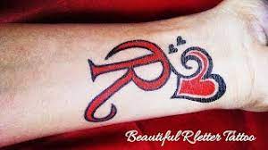 Maybe you would like to learn more about one of these? Beautiful R Letter Tattoo With Love Heart Youtube